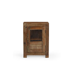Vintage teak locker with single door. There's an open panel covered with metal mesh. It has one inner shelf and a brass handle. The front frame has carved lines. Showing frontview.