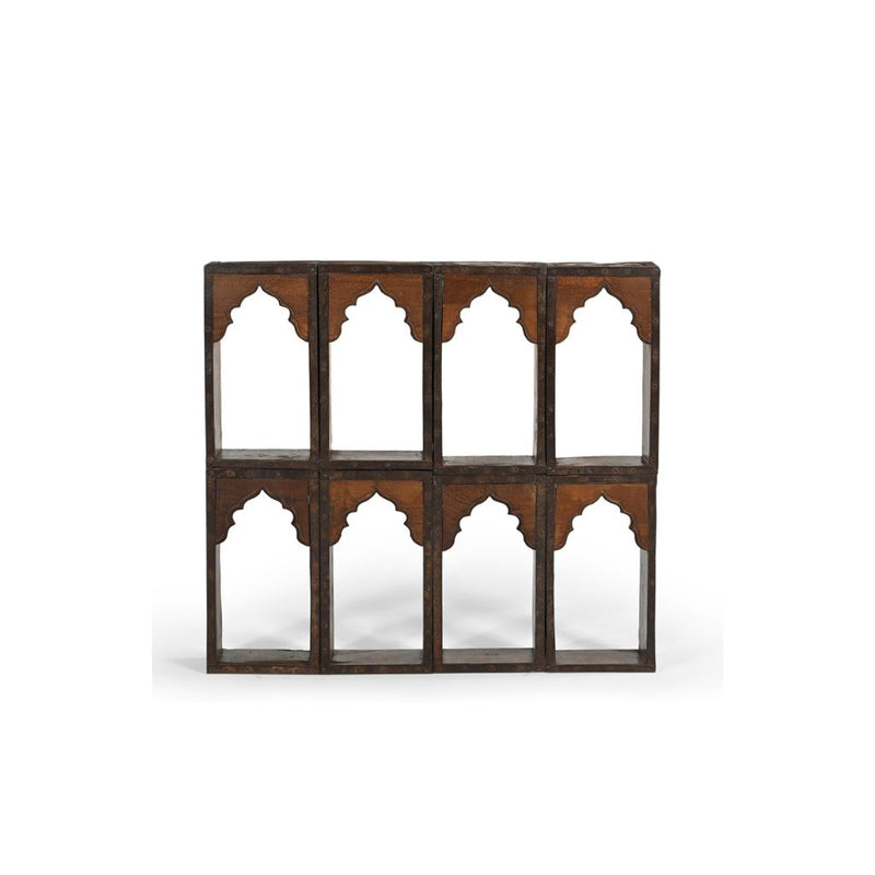 Wall shelving unit made of 8 reclaimed brick moulds with oriental ornamental fronts.