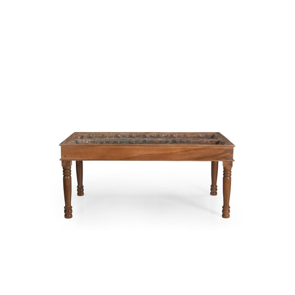 Wooden table with glass top on white background