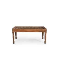 Wooden table with glass top on white background