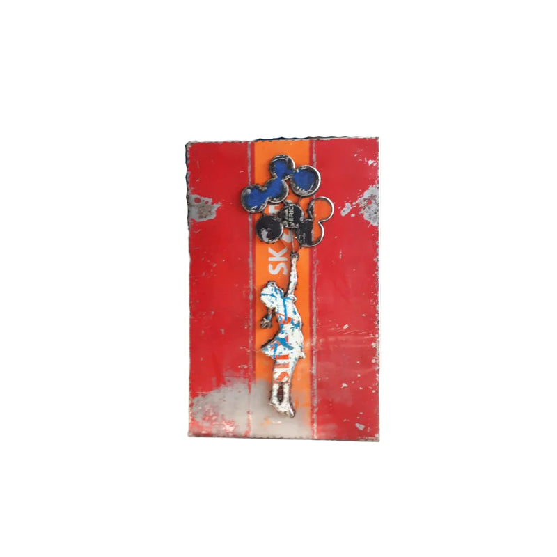 Recycled Metal art work panel representing Banksy Street Art Girl with balloons. background is red & orange, girl in white with balloons blue, black & orange.