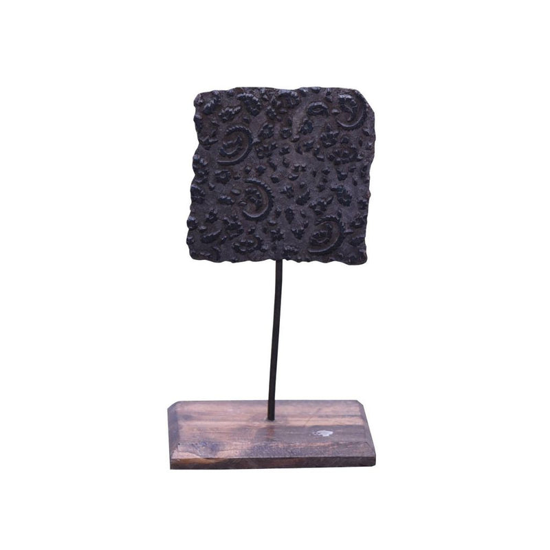 Block Print on a wooden stand on a white background