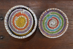 handcrafted set of 12 coaster in basket open with coasters inside