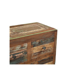 Detail of a drawer and top of the dresser on a white backround