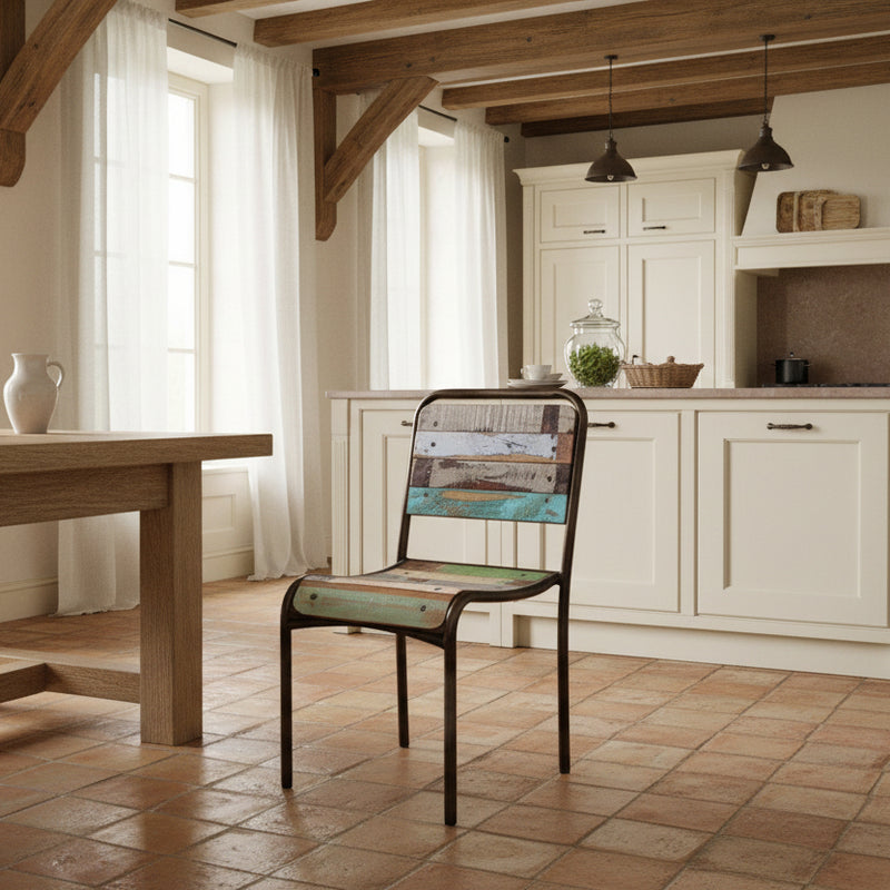 metal chair with reclaimed coloured wood on the seat ad back in a country style kitchen