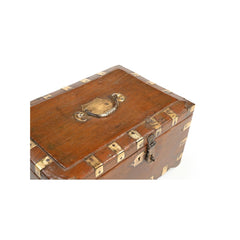 Vintage teak wood small box with brass casings, brass lock and brass handle showing the brass handle