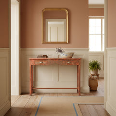 Wooden console table with two drawers in a hall
