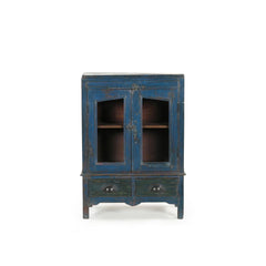 Deep blue glass cabinet with 2 doors nd 2 drawers at the bottom frontview