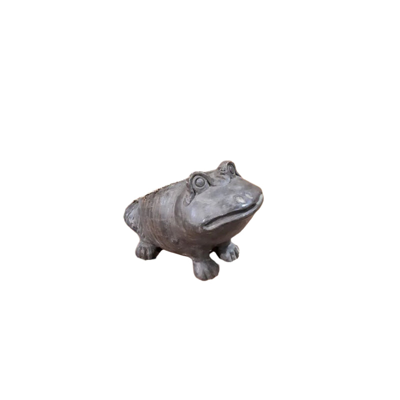 Brown frog carved from clay with the top open to put a round plant pot, sitting on 4 legs with 2 big eyes