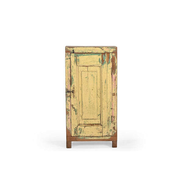Vintage wooden cabinet with peeling paint on a white background