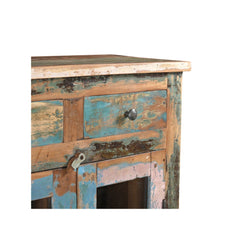 Glass cabinet made of reclaimed wood in a blue/pink patina with 2 top drawers, showing the detail of the drawers