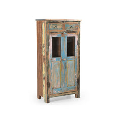 Glass cabinet made of reclaimed wood in a blue/pink patina with 2 top drawers, showing the side.