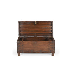 Wooden trunk with open lid on a white background