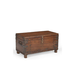 Wooden trunk on a white background showing the side handle.