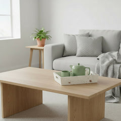 white wood tray on a coffee table in a living room