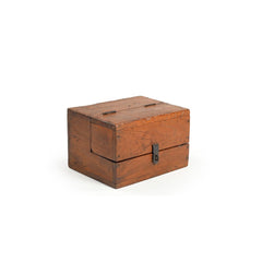 Vintage teak wood box with a lockable latch showing the side. The opening top is halfway top, halfway front making it unusual.