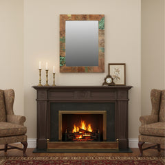 Rectangular mirror with a wooden frame featuring geometric patterns in a living room