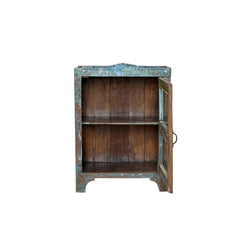 Wooden cabinet with distressed finish on a white background