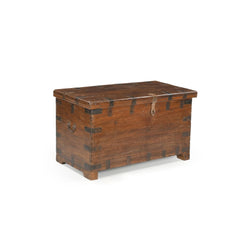 Vintage Teak wood trunk with metal casing around the hedges and a brass lokable latch, showing the side.