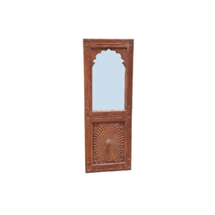 Old  window frame in natural wood with the top part being a mirror and the bottom part carved in a rosace design.