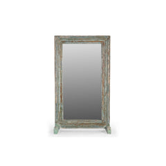 Reclaimed wood window frame with a distressed blue/green patina on a wood stand. 