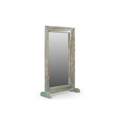 Reclaimed wood window frame with a distressed blue/green patina on a wood stand. Showing the side.