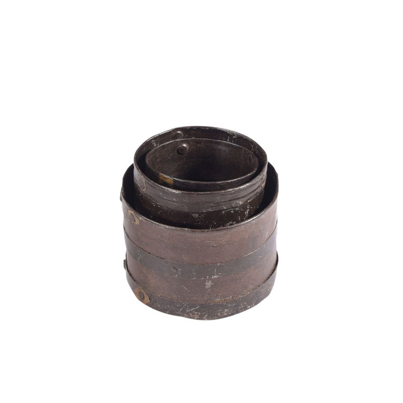 Vintage Metal pots set of 3 staked on a white background