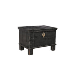 Small trunk black with 4 short legs and brass lock side view