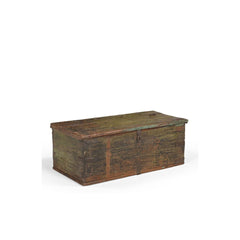 side of a vintage wood trunk on a white background