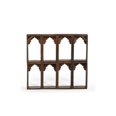 Wall shelving unit made of 8 reclaimed brick moulds with oriental ornamental fronts, showing the back.