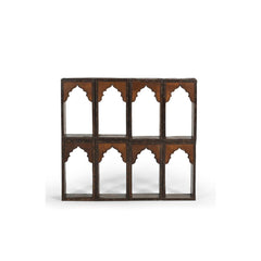 Wall shelving unit made of 8 reclaimed brick moulds with oriental ornamental fronts.