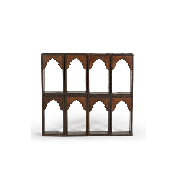 Wall shelving unit made of 8 reclaimed brick moulds with oriental ornamental fronts.