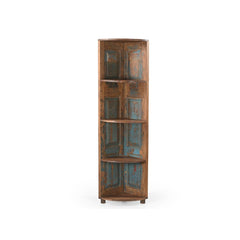 A rustic corner shelving unit made from distressed wooden doors, featuring a warm brown wood frame with peeling blue and red paint, set against a plain white background.