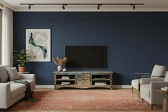 Reclaimed wood TV stand with a distressed finish in a living room