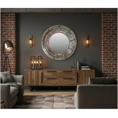 round metal mirror in a living room