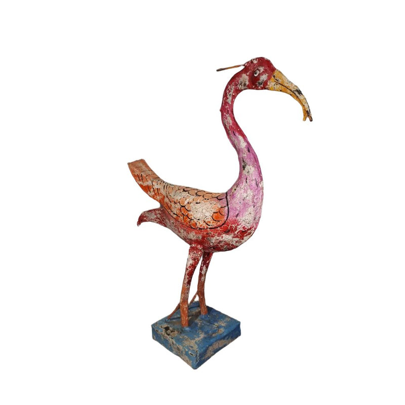 Handpainted metal exotic pink bird with yellow beak on a blue square stand