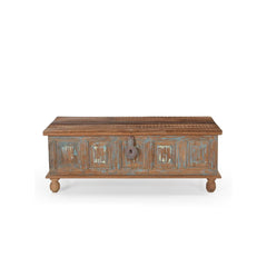 Wooden trunk with decorative carvings on a white background