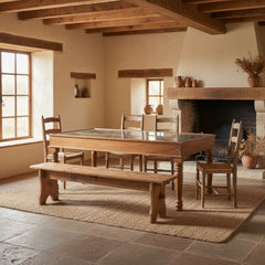wooden table with glass top in a country style dining room