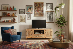 A reclaimed wood media console with a whitewash finish and black iron hardware, featuring two doors and 2 drawers in an eclectic style living room