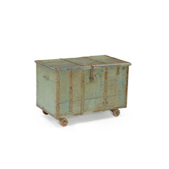 Vintage light blue wood trunk on 4 wheels with a metal latch & metal casing side view