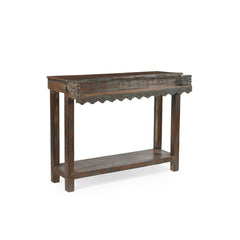 Wooden console table with decorative carvings on a white background, showing the side.