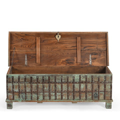Wooden trunk with the top open revealing the natural wood inside  on a white background