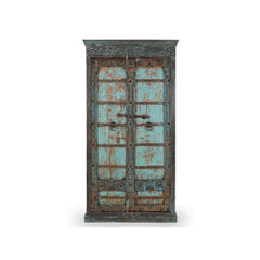 Vintage-style wooden cabinet with distressed turquoise paint on a white background