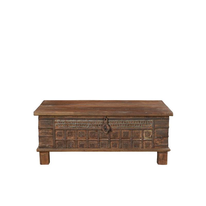 Vintage natural Wood Trunk with metal casing decorations in a square designs, a large lock on 4 wooden square legs. Showing the front.