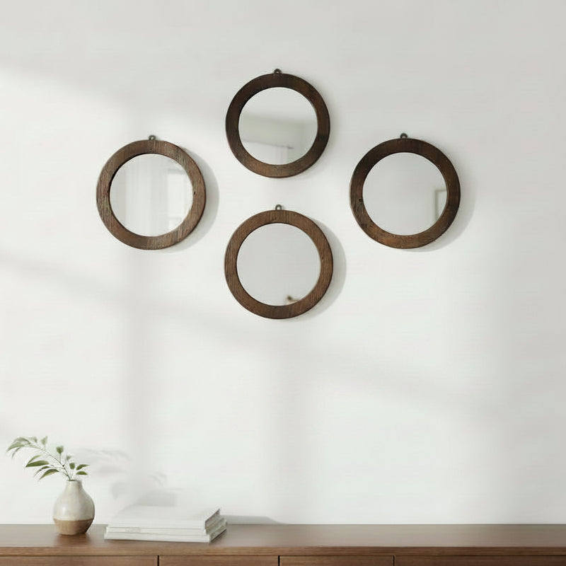 A round wall mirror with a rustic, weathered dark brown wooden frame, shown against a plain white background.