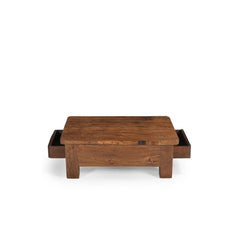 Wooden coffee table with storage drawers on a white background