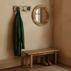 2 hooks on an antique panel with decorative green flowers in a hallway