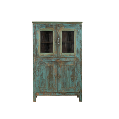 A rustic distressed cabinet with a weathered turquoise and green paint finish, featuring two upper glass-front doors and two lower paneled doors, shown against a plain white background.