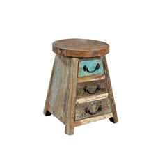 Wooden stool with three drawers on a white background
