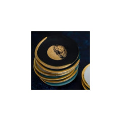 ring dish on a pile on a dark background